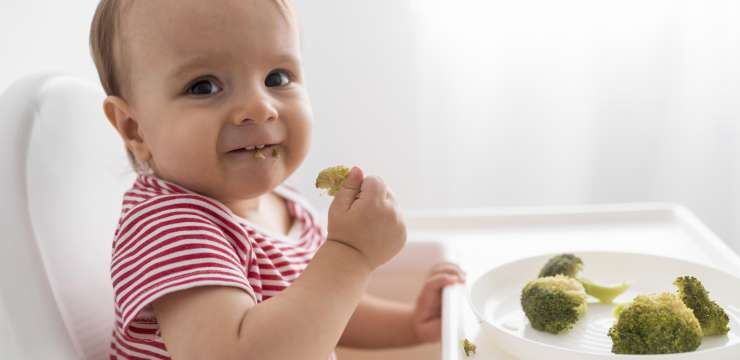 baby playing with food