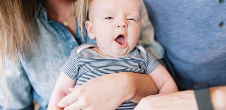 yawing baby in mother lap, baby twinkle,